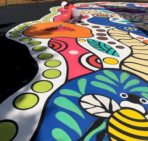 Artist Sally Terare working on her stunning piece for the Kingston Butter Factory Cultural Precinct plaza.