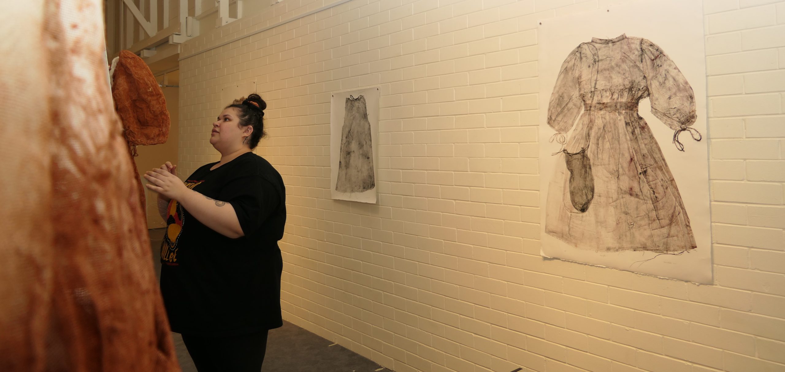 Artist Kyra Manktelow during the installation of her exhibition, Unsilenced, at the Logan Art Gallery