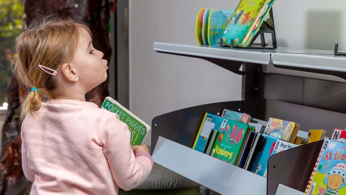 A child perusing books.