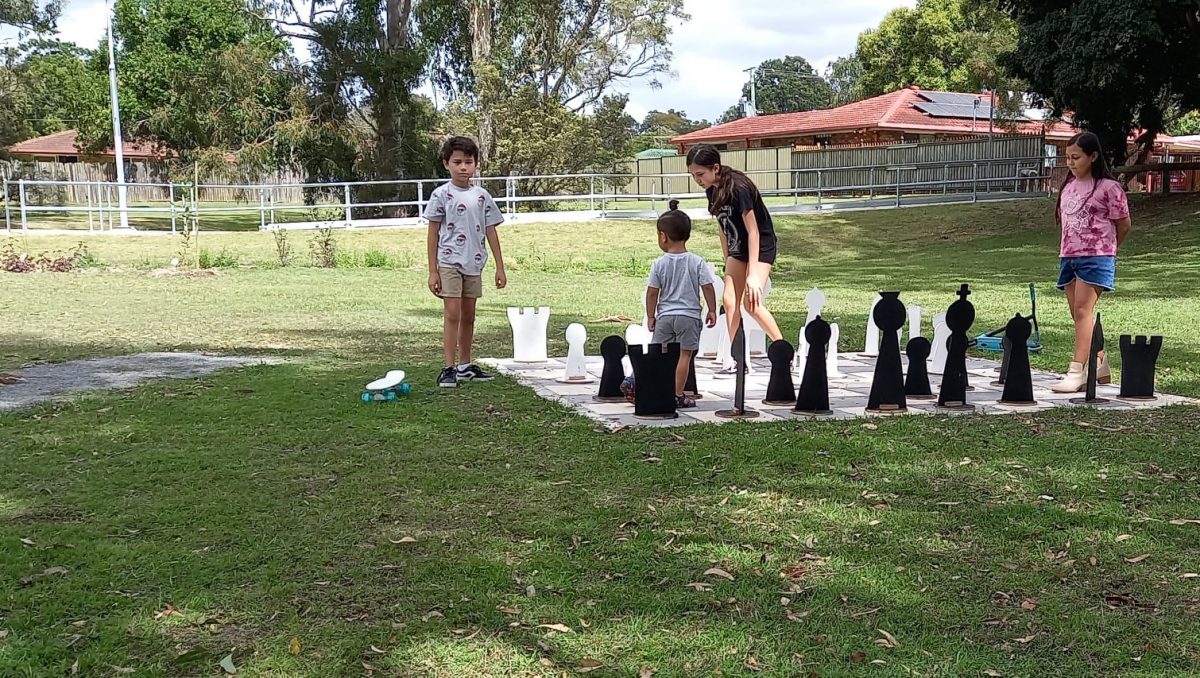 Our Logan | Logan City Council | What's On in Logan - budding chess champions at Jimbelungare Community Garden.