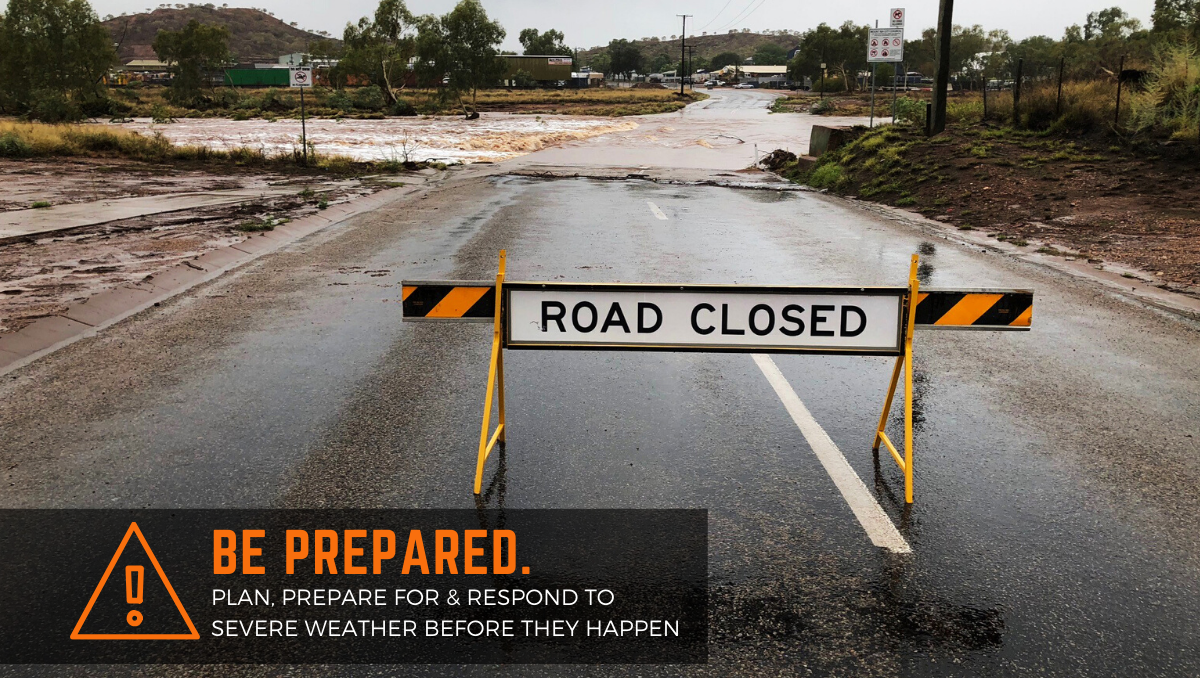 An image of a flooded road. City of Logan residents can get the latest flooding and storm information through the free Early Warning app or Council’s disaster dashboard