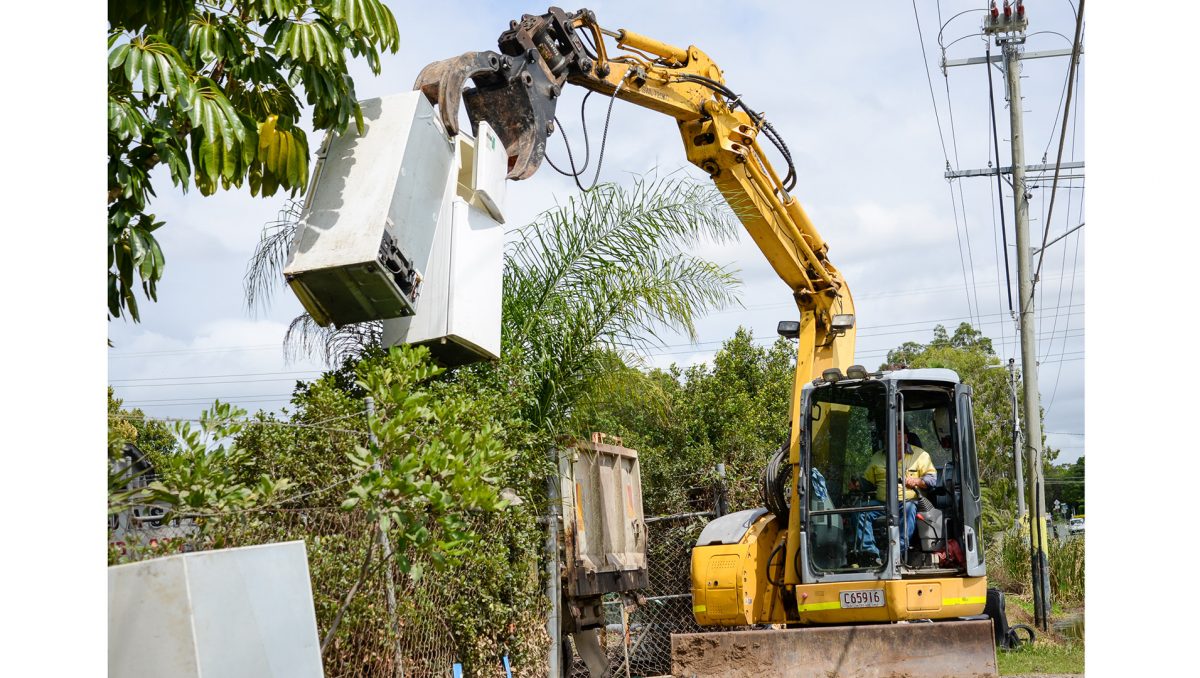 A photograph of kerbside clean-up efforts on a City of Logan street.