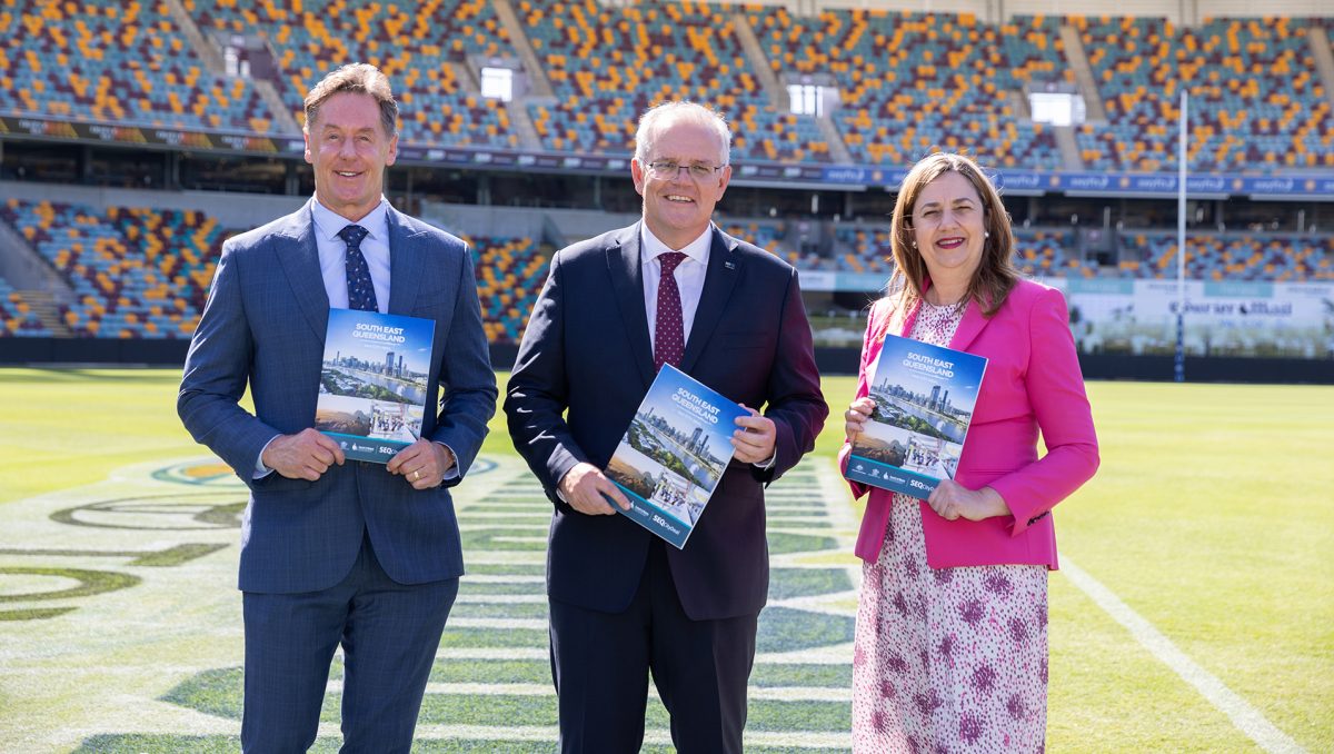 A photograph of City of Logan Mayor Darren Power at the SEQ City Deal signing on Monday with the Prime Minister Scott Morrison and Queensland Premier Annastacia Palaszczuk.