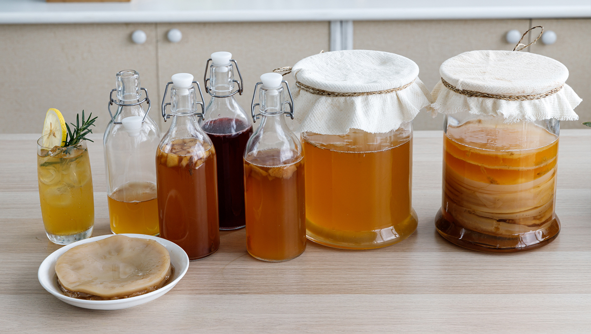 The straining process to make kombucha.