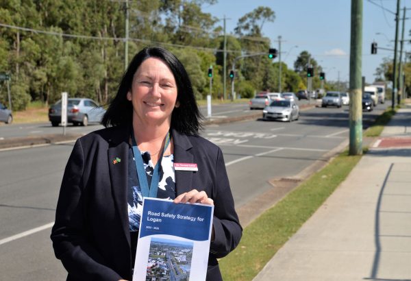 Logan City Council Infrastructure Chair Councillor Teresa Lane with the SafeRoads4Logan Road Safety Strategy 2022-26.