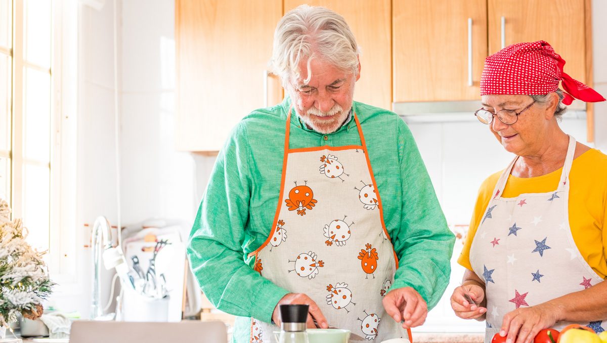 Logan City Council events - older couple cooking together in a workshop.