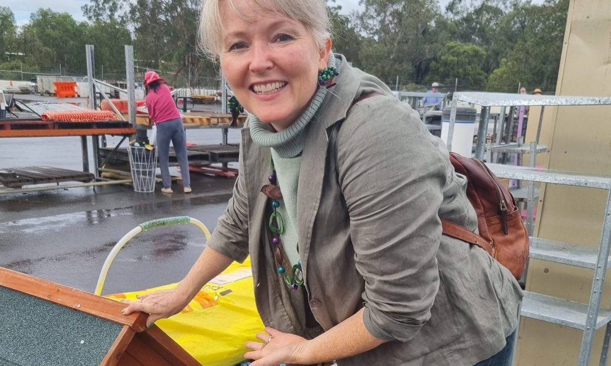 Louise Wheatley picks up a bargain at Logan Recycling Markets