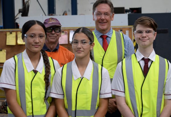 City of Logan Mayor Darren Power visits Frontline Manufacturing at Meadowbrook. He is with boilermaker Tony Loibl (left) and Marsden State High School students Nikola Macdonald, Cerese Amaru and Cody Ceder.