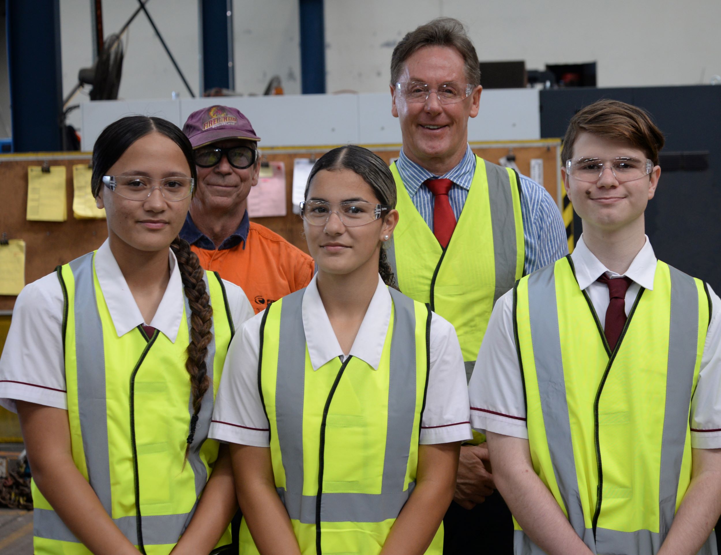 City of Logan Mayor Darren Power visits Frontline Manufacturing at Meadowbrook. He is with boilermaker Tony Loibl (left) and Marsden State High School students Nikola Macdonald, Cerese Amaru and Cody Ceder.
