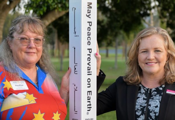 Cr Laurie Koranski and Heather Kucks with the Windaroo Peace Pole