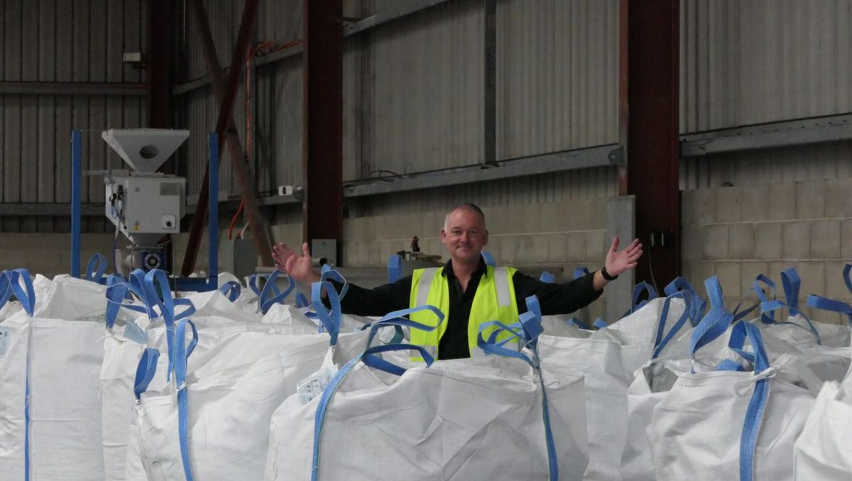 Graham Ross with donated fabric for recycling at BlockTexx