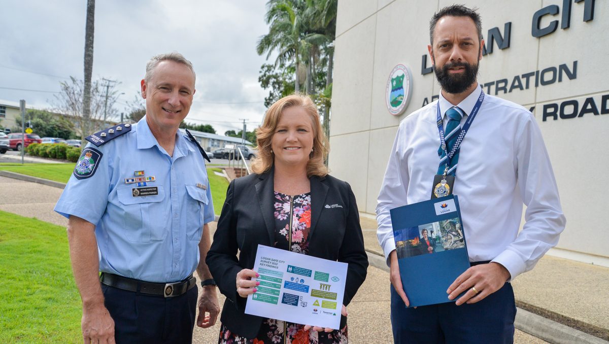 City Lifestyle Chair, Councillor Laurie Koranski (centre) discusses the results of the 2022 Logan Safe City Survey with Detective Senior Sergeant Glen Antonie (left) and Acting Inspector Warren Parker.