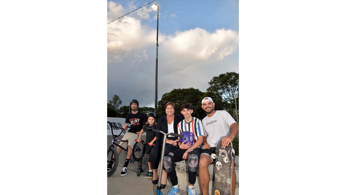 An image of Division 12 Councillor Karen Murphy under the new lights at Doug Larsen Park in Beenleigh with (from left) Chris James, of Coomera; Zachariah Moore, of Bribie Island; Jake Mitchell, of Holmview; and Tristan Strange, of Beenleigh.