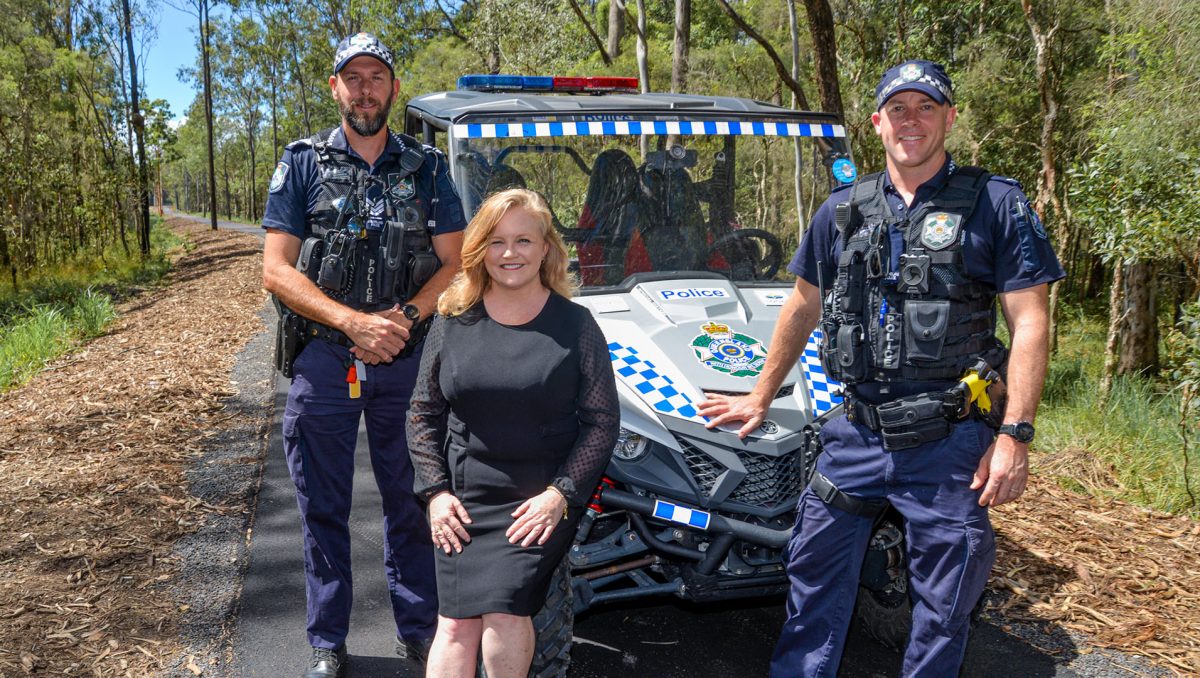Cr Laurie Koranski with local police on the Logan Village to Yarrabilba section of the Rail Trail.