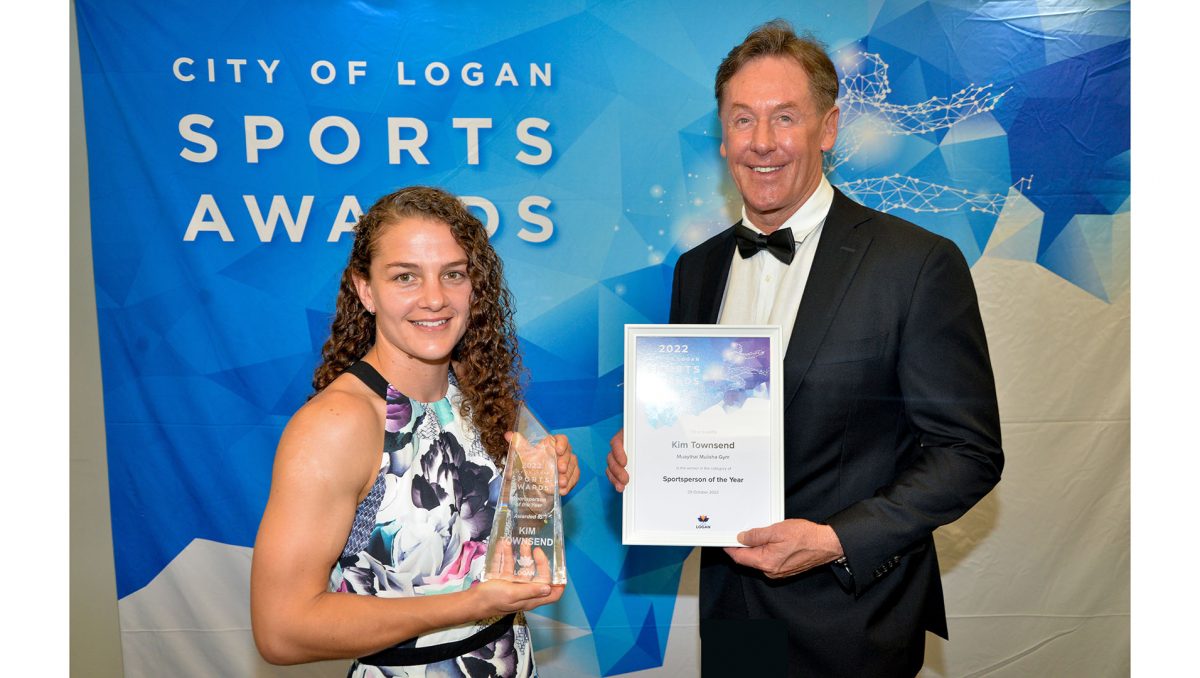 Mayor Darren Power and the 2022 City of Logan Sportsperson of the Year Kim Townsend.