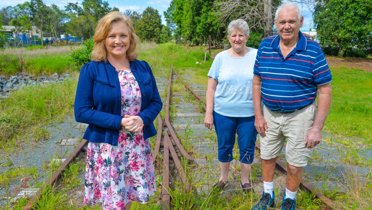 Cr Laurie Koranski and residents from Opal Gardens at Logan Village, Chris and Terry Steele, at the proposed route for the Bethania to Logan Village Rail Trail.