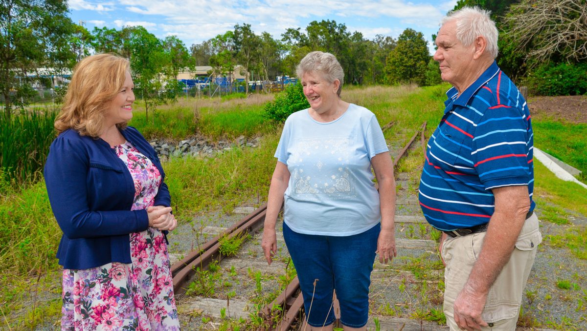 Cr Laurie Koranski and residents from Opal Gardens at Logan Village, Chris and Terry Steele, at the proposed route for the Bethania to Logan Village Rail Trail.