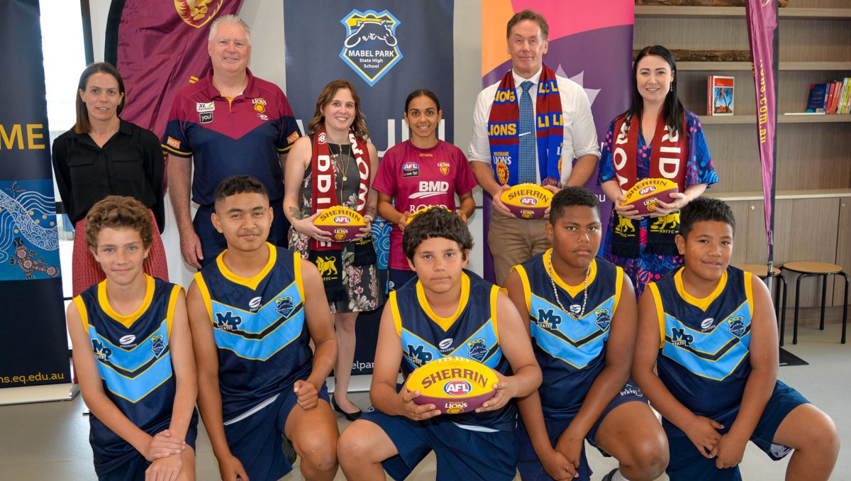 City of Logan Mayor Darren Power and Division 3 Councillor Mindy Russell (back right) with AFL Queensland's Trisha Squires, Brisbane Lions CEO Greg Swann, Mabel Park SHS principal Aimee Agiro, AFLW star Courtney Hodder and (front) Mabel Park SHS students Angus Bradow, Claudius Feo, Geremy Kickett, Israel Ratuere and Albert Laga'aia.