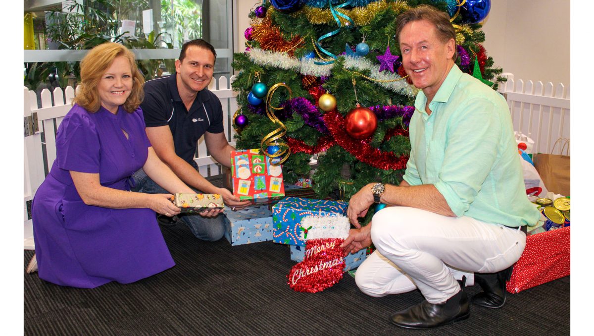 Mayor Darren Power (right), City Lifestyle Chair Councillor Laurie Koranski and Division 6 Councillor Tony Hall with gifts donated for Logan City Council’s internal Salvation Army Christmas Appeal.