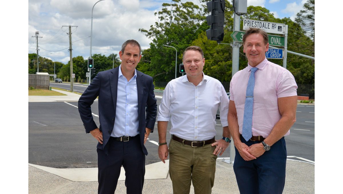City of Logan Mayor Darren Power, right, with Federal Treasurer Jim Chalmers and Brisbane Lord Mayor Adrian Schrinner at the new traffic lights.