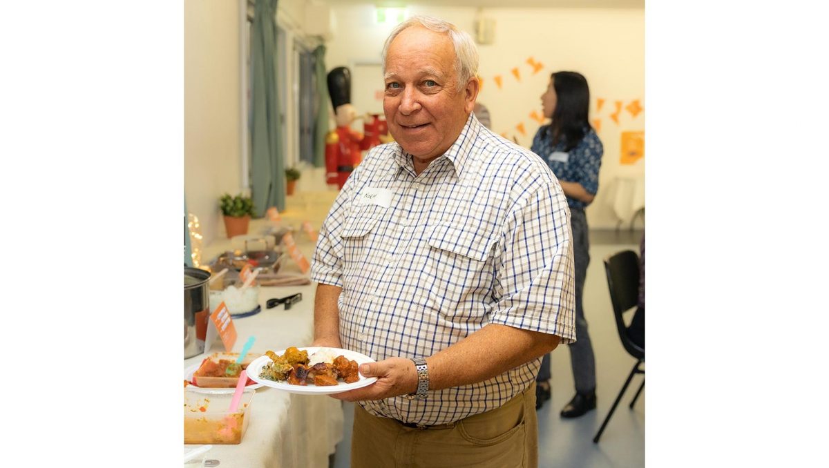 Norm Crisp enjoys a meal at a recent Stories from the Kitchen event.