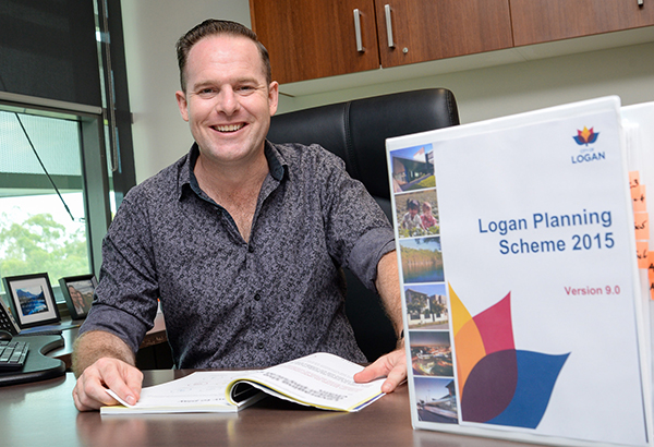 Planning Chair, Cr Jon Raven looks over the City of Logan’s updated Planning Scheme.