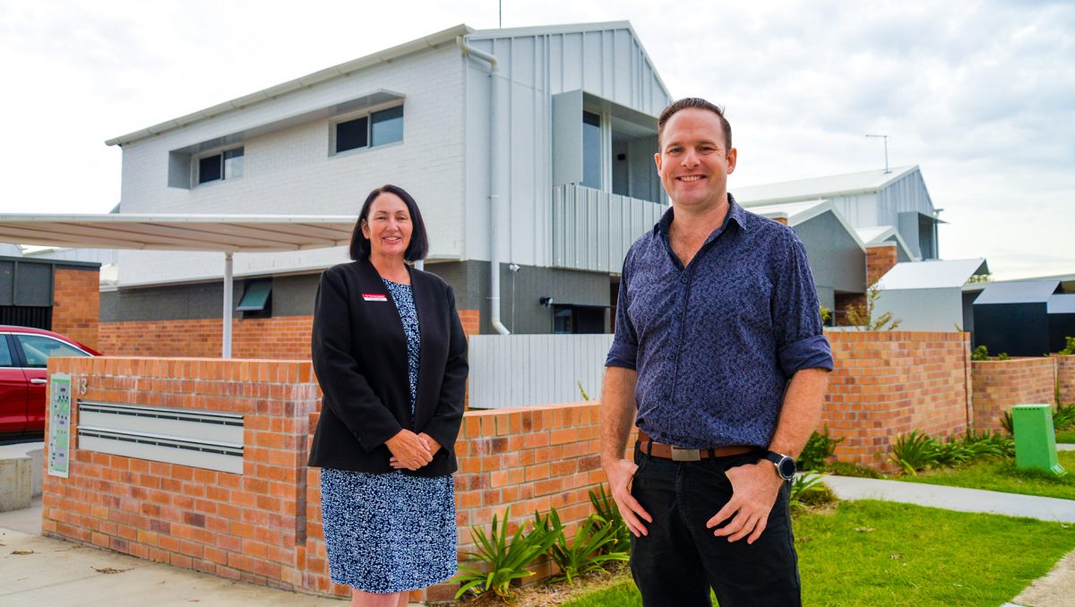 Economic Development Chair Councillor Jon Raven and Division 2 Councillor Teresa Lane outside the ‘Habitat on Juers’ housing development in Kingston that won two accolades at the 2023 Logan Urban Design Awards (LUDA).