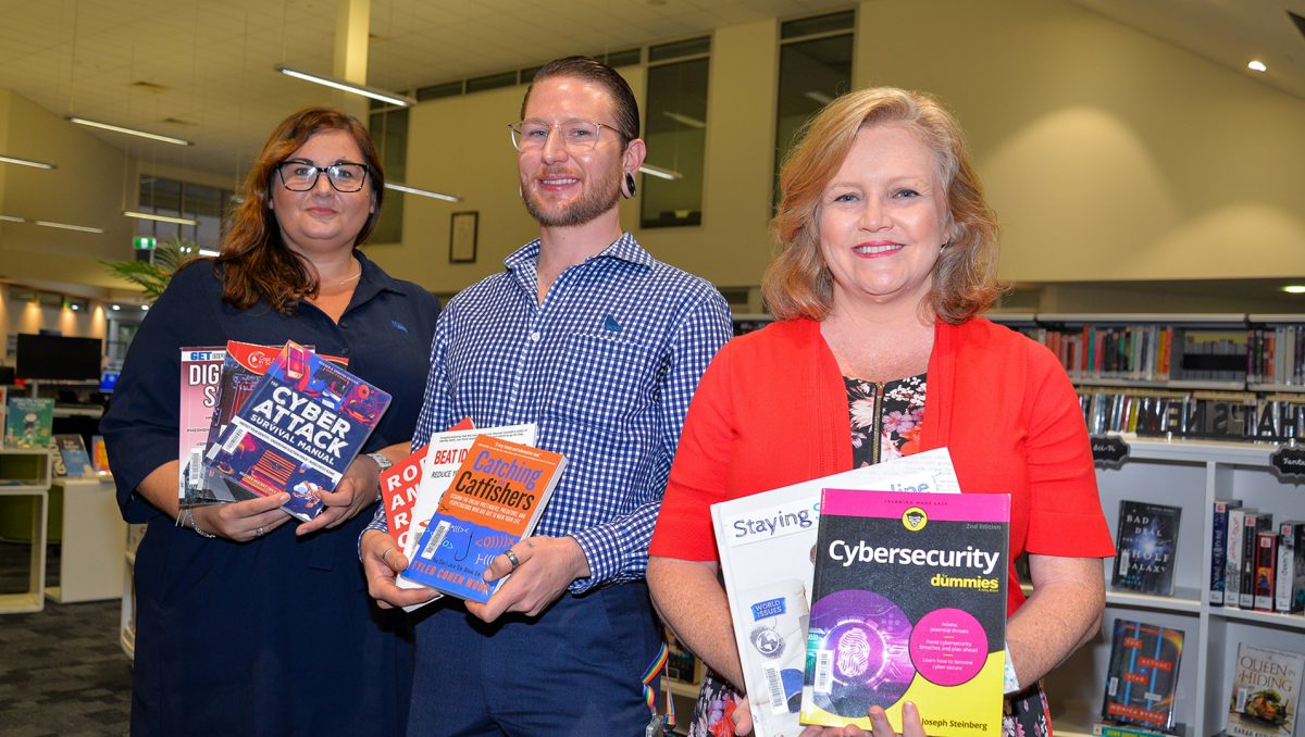 City Lifestyle Committee Chair Councillor Laurie Koranski (right) and Kelly Reed (far left) and Justin Armstrong from The Bank of Queensland’s Logan Central branch are inviting the community to learn more about protecting themselves from scams and frauds.