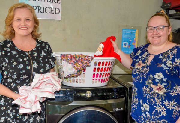 Councillor Laurie Koranski (left) with Defenders for Hope director Tomeeka Smith, at the charity’s new laundry service.