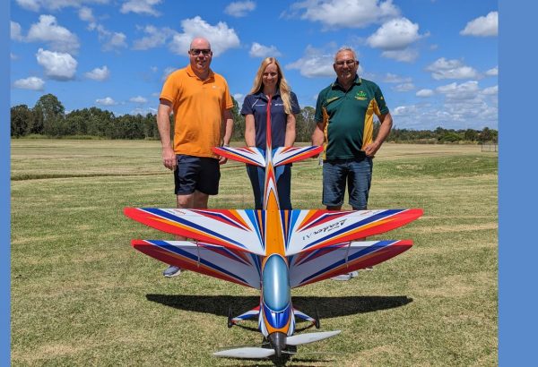 Councillor Miriam Stemp with LARCS President Michael Hobson (left) and long-time club member Peter Pennisi at the Loganholme ‘airfield’.