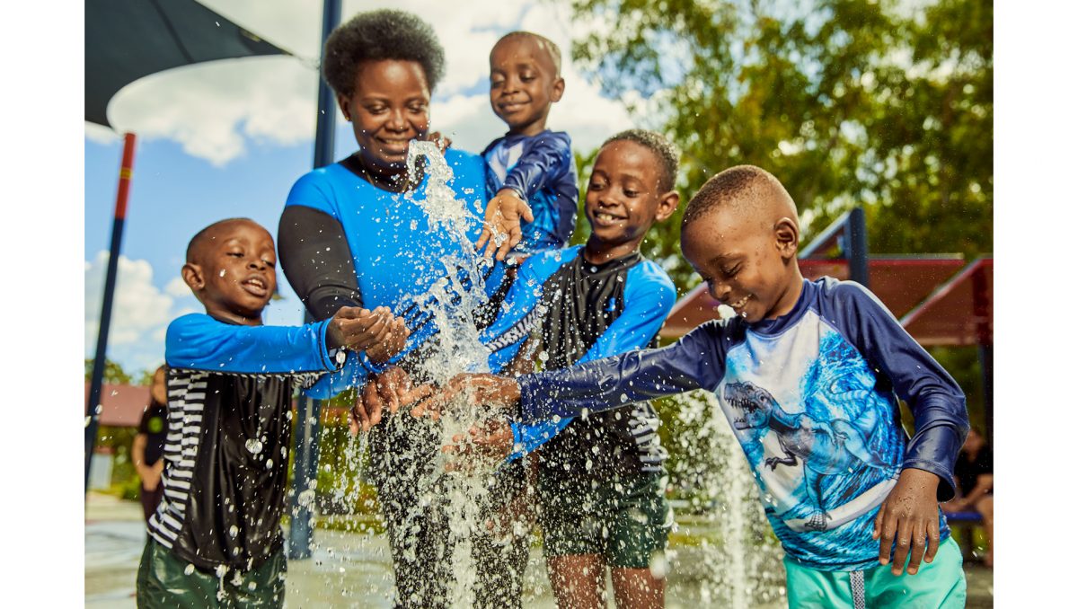 Kingston resident Thereze Milburo and her sons (from left) Kevin, Evin, Eddy and Freddy Miburo participated in the ‘Now I can swim’ video.