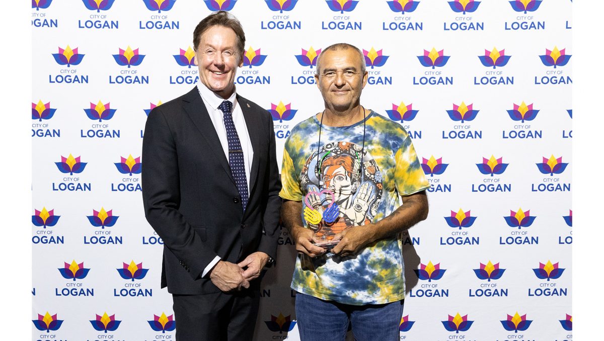 Mayor Darren Power with Spirit of Logan Award winner Spencer Robinson.