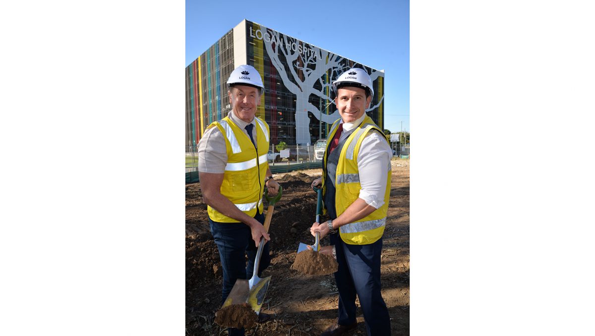 Mayor Darren Power (left) and Councillor Tony Hall celebrate the start of Stage 2 of Council’s Loganlea Road Healthy Street project.