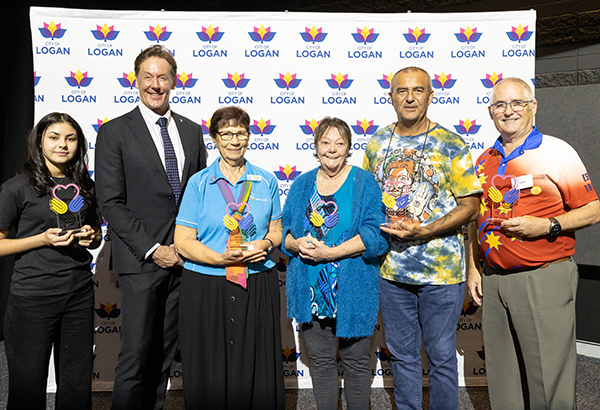 Mayor Darren Power, second from left, with the Logan CIty Council Volunteer Awards winners.