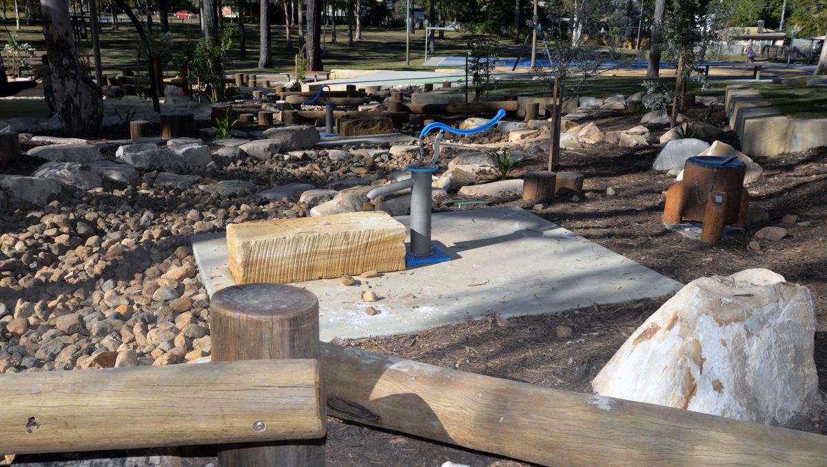 An image of one of the Water play pumps dot the dry creek bed, which is part of the upgrade to Eridani Park at Kingston.f