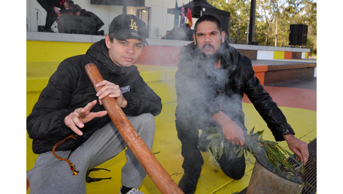 Rhys Monaghan (left) and Tommy Bundambah Yah Coghill will be part of the traditional smoking ceremony at the Logan NAIDOC Family Fun Day.