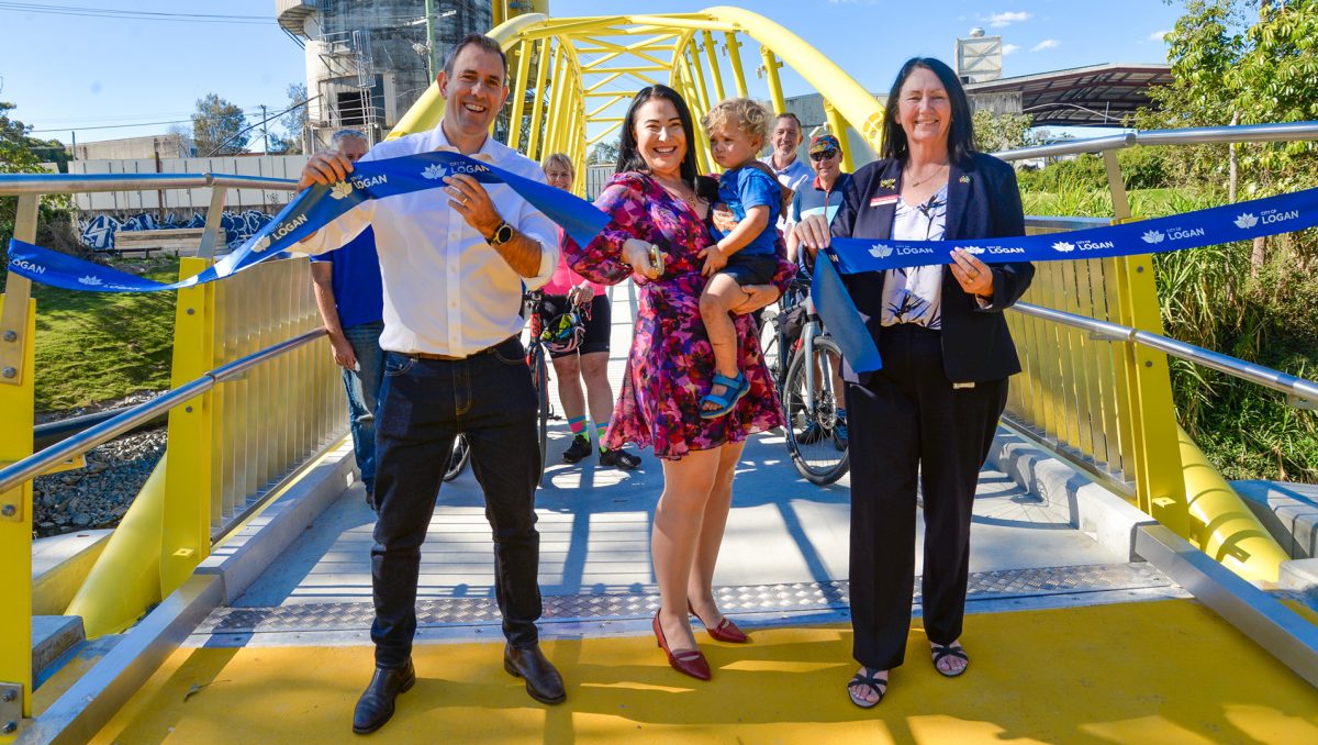 (From left) Federal Treasurer Jim Chalmers, Division 3 Councillor Mindy Russell and Infrastructure Chair Councillor Teresa Lane are joined by young Slacks Creek resident Harrison-Ford Tawse, 2, for the opening of the Slacks Track pathway.
