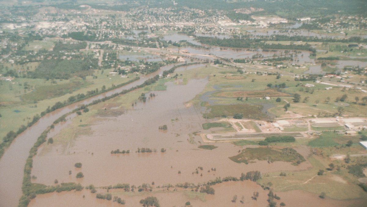 Photographer Albert Wharton took this image of flooding near the Loganholme Waste Water Treatment Plant (on right) in April, 1989.