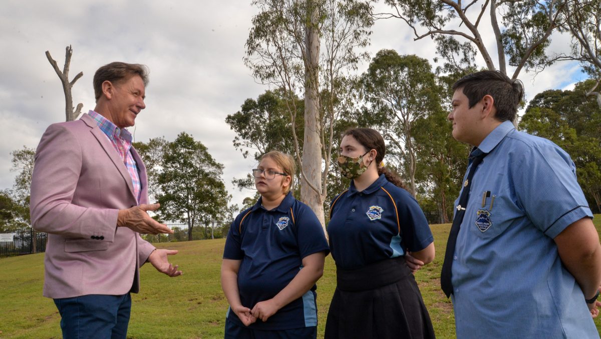 Mayor Darren Power chats to Mabel Park State High School students (from left) Jaay Jay, Tori and Tyler.