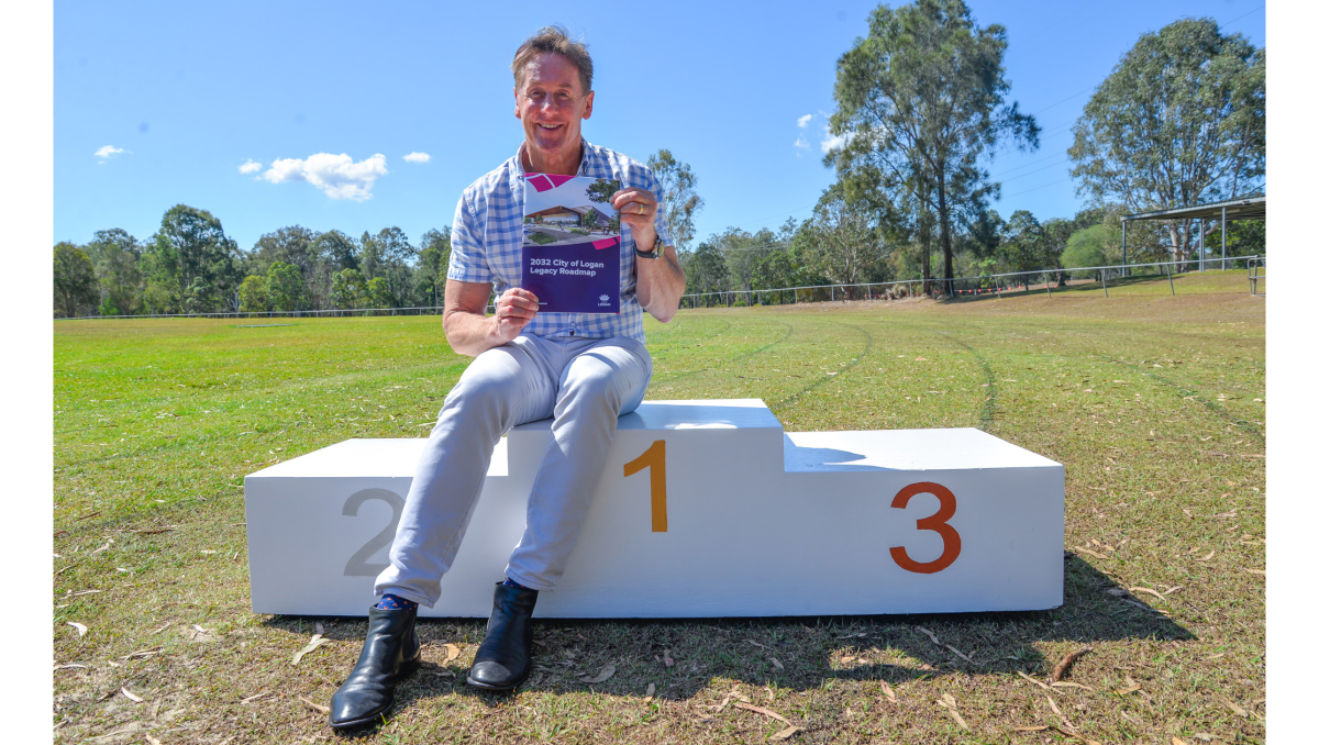 Mayor Darren Power, pictured at the Springwood Sharks Little Athletics centre, wants to hear the community’s ideas on positioning the City of Logan for Olympic success.