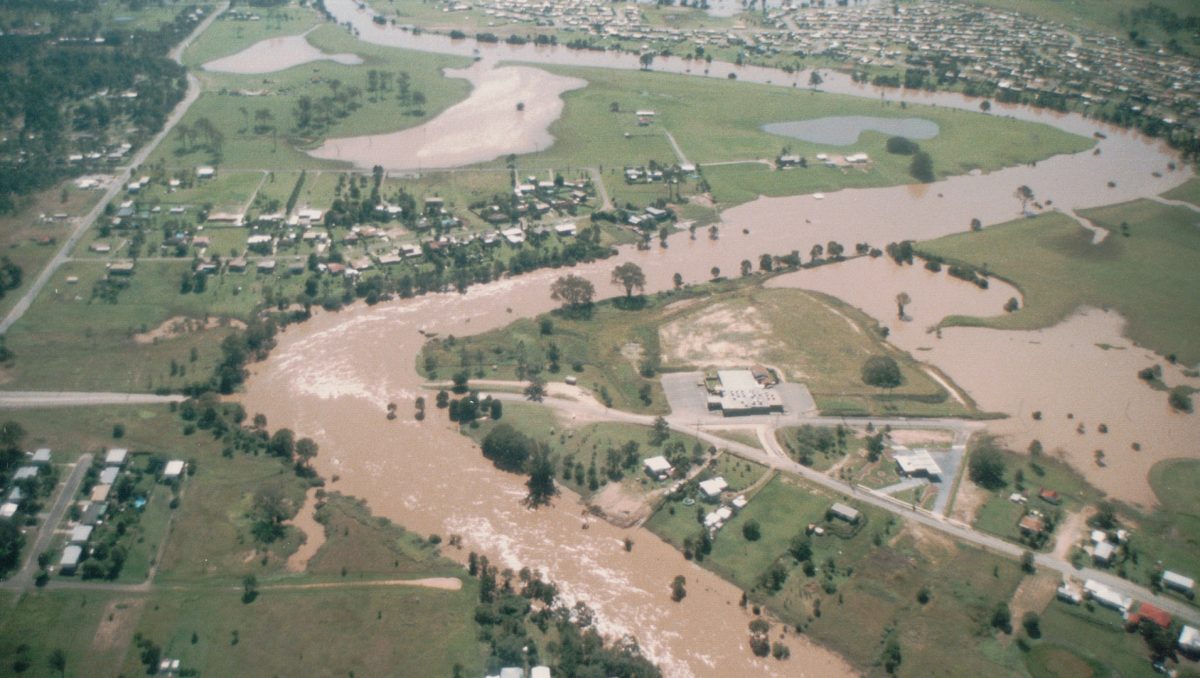 Photographer Albert Wharton captured floodwaters over the Waterford Bridge and near Fitzys Hotel in April, 1989.