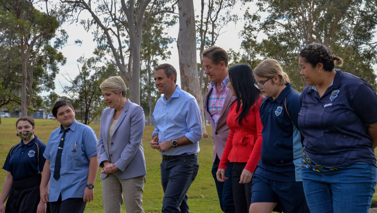 Mabel Park State High School students (from left) Tori, Tyler and Jaay Jay walk along Slacks Creek in Mabel Park with Federal Minister for the Environment and Water Tanya Plibersek MP, Federal Treasurer Jim Chalmers MP, Mayor Darren Power, Cr Mindy Russell, and teacher Renee.