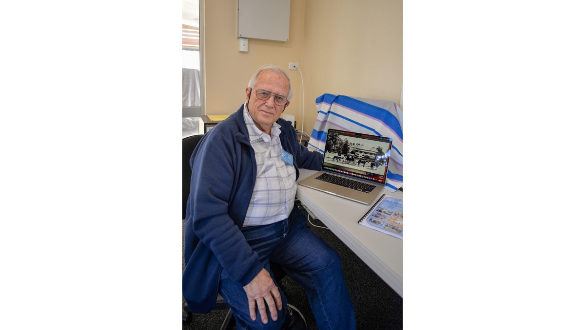 Logan River Family History President Rob Thomson with a photo of Hazeldean Homestead taken in 1900 which was home to his maternal great grandfather James Litchfield who established pastoral company Hazeldean Pty Ltd.