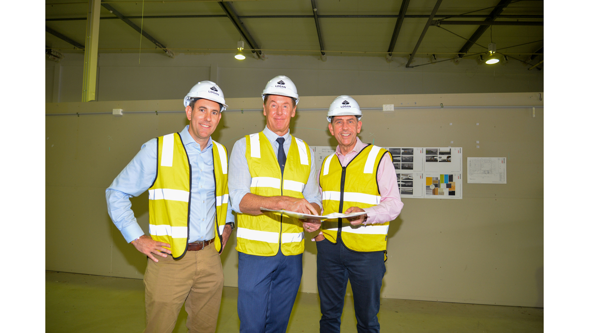 Celebrating the launch of the Wilbur St Youth Centre are Mayor Darren Power and (from left) Federal Treasurer and Member for Rankin Jim Chalmers and State Treasurer and Member for Woodridge Cameron Dick.