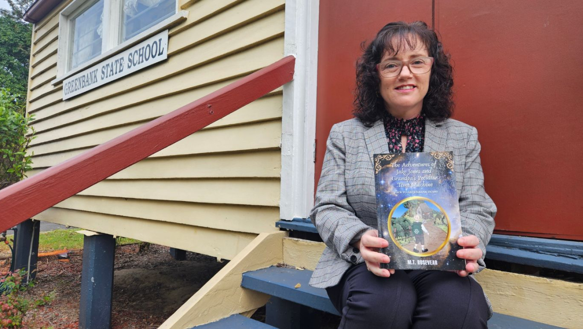 Marion Rosevear and the book she wrote with son Brycen