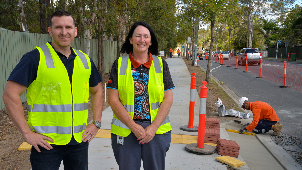Division 6 Councillor Tony Hall and Infrastructure Chair, Councillor Teresa Lane, at the new section of cycleway on Station Rd, Loganlea.