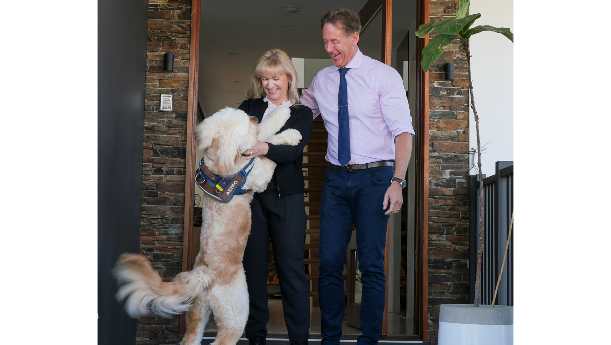 Mayor Darren Power, wife Lynne and their dog Astro.
