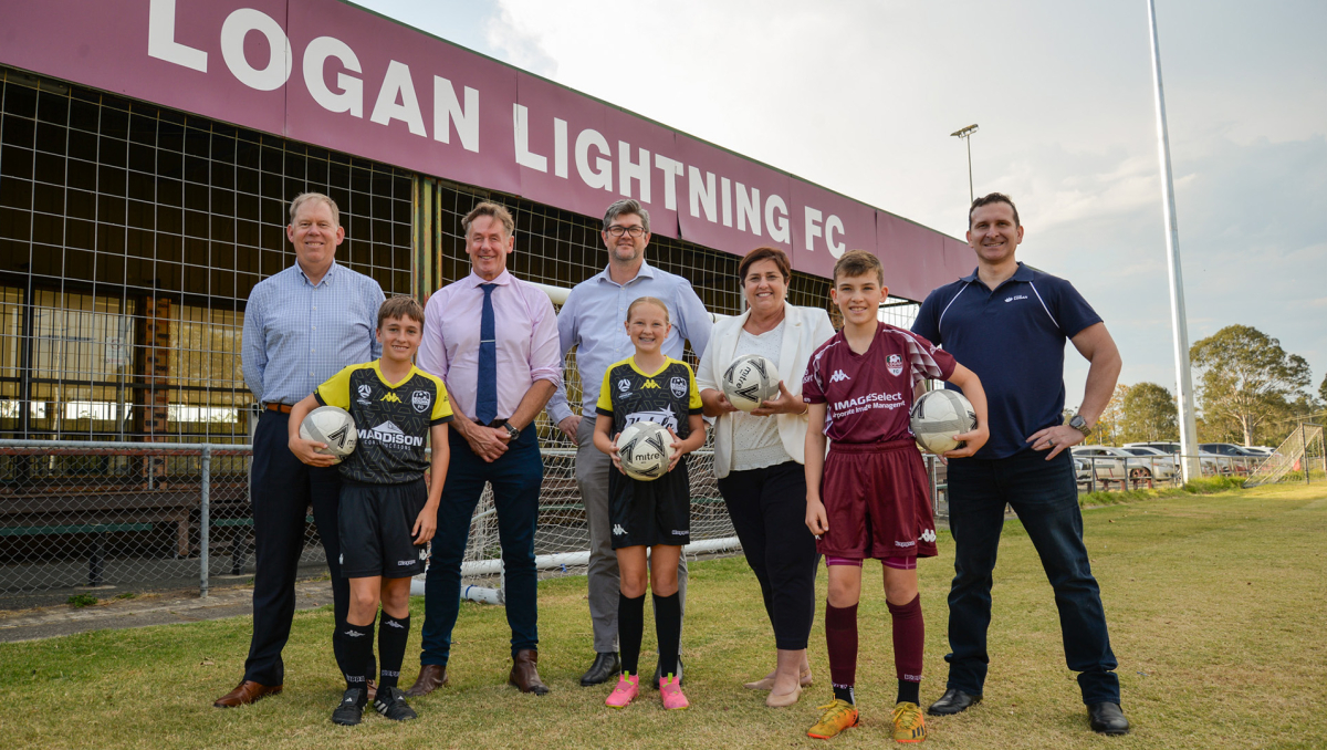 Mayor Darren Power and (from back left) Member for Forde Bert van Manen, Logan Lightning FC President Andrew Birkett, Cr Karen Murphy, Cr Tony Hall, (from front left) and Logan Lightning FC junior players Will Shaw, Piper Fisher and Archie Chapman mark the start of works on the new clubhouse to house the Logan Lightning FC at Chris Green Park, Beenleigh.