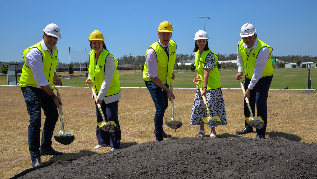 Mayor Darren Power with (from left) Mirvac General Manager Residential Queensland Warwick Bible, Division 11 Councillor Natalie Willcocks, Head of AFL Queensland Trisha Squires and Mirvac Residential Queensland Project Director Mark Clancy at the official sod turning of the Everleigh Sports Park Clubhouse.