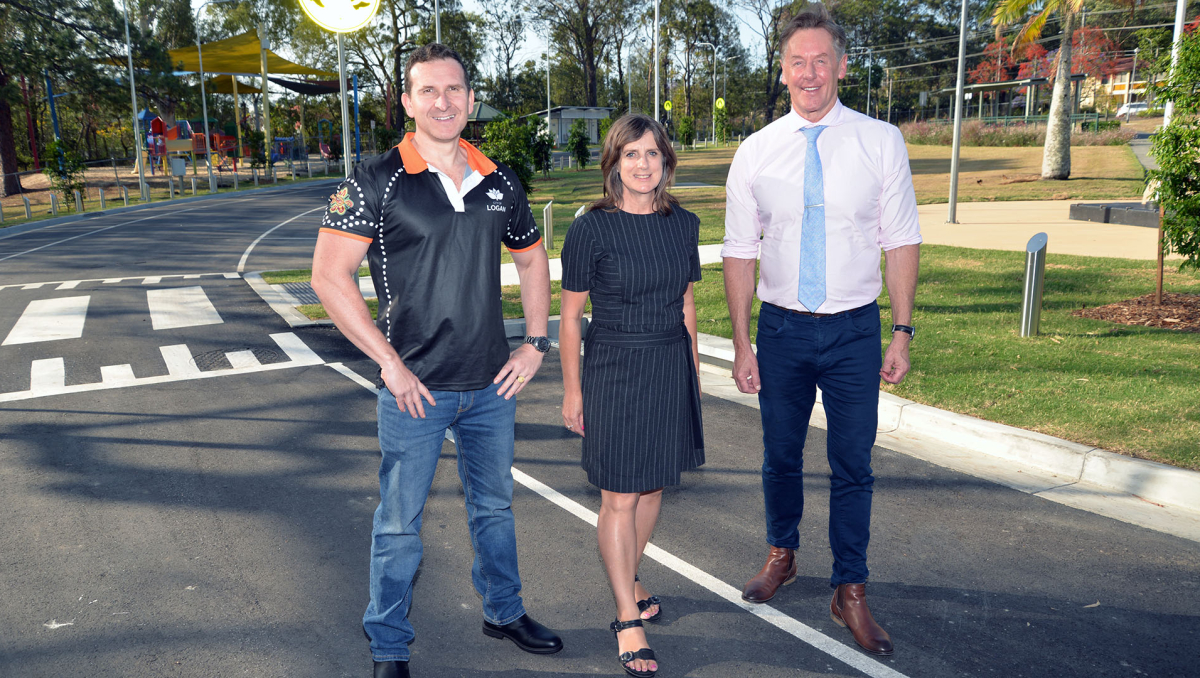 (From right) Mayor Darren Power, Division 1 Councillor Lisa Bradley and Lifestyle Chair Councillor Tony Hall on the new ring road in Springwood Park.